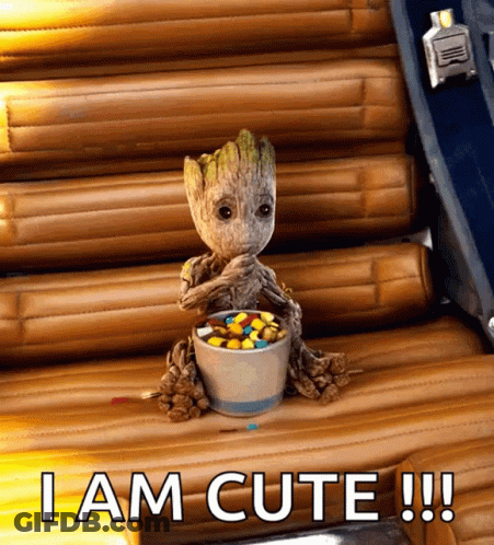 Baby Groot Sitting With Bowl Of Candy Saying I Am Cute GIF