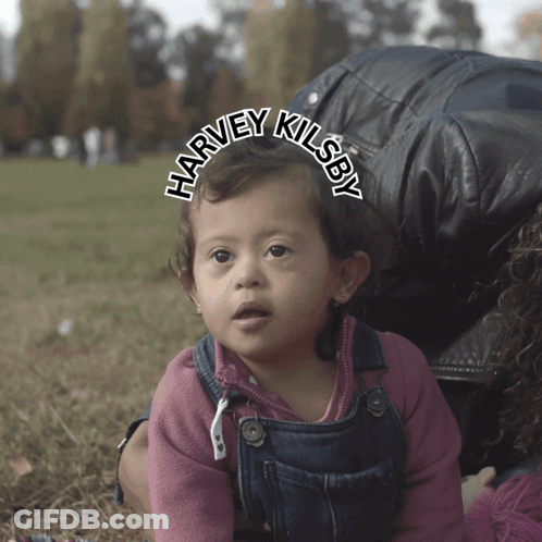Baby Harvey Kilsby Held By Woman GIF