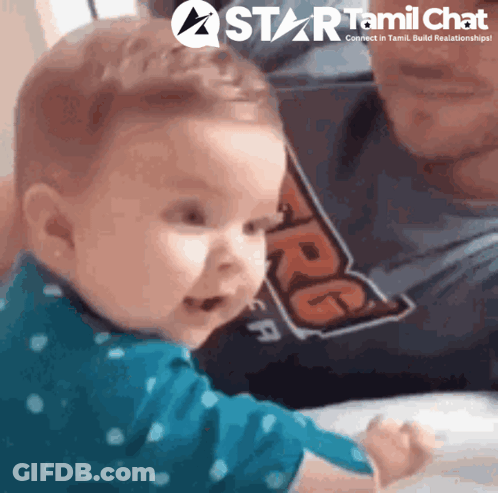 Baby Held By Man In Star Tamil Chat Ad GIF