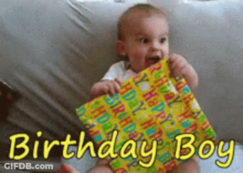 Baby Holding Birthday Present GIF