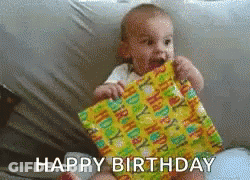 Baby Holding Birthday Present Saying Happy Birthday GIF