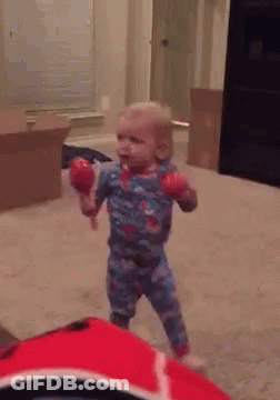 Baby Holding Maracas GIF