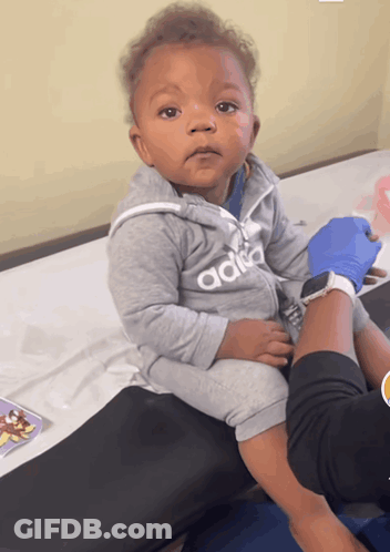 Baby In Adidas Jacket Sitting GIF