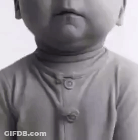 Baby In Black And White Turtleneck Sweater GIF