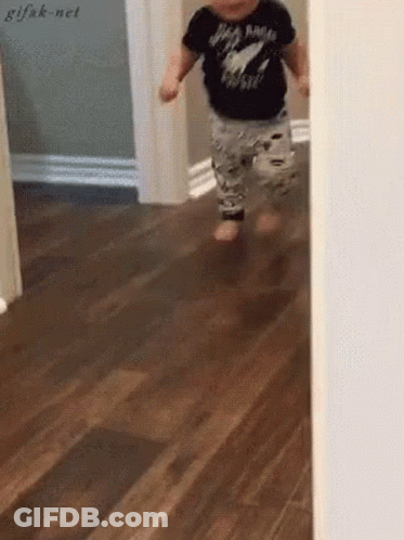 Baby In Black Rock N Roll Shirt Walking GIF