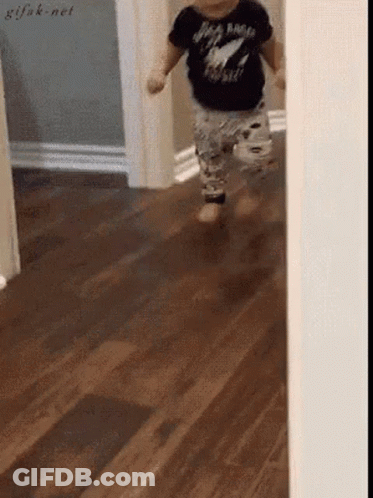 Baby In Black Shirt Saying Rock N Roll GIF