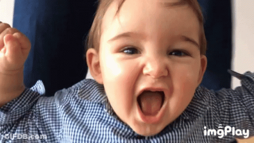 Baby In Blue And White Plaid Shirt Smiling GIF