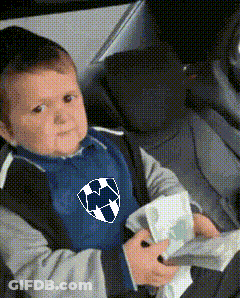 Baby In Blue Shirt With Soccer Ball In Car Seat GIF