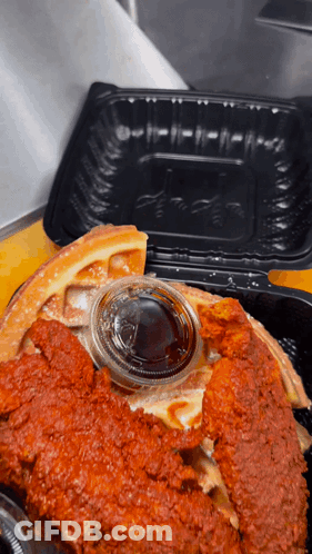 Baby In Cheetah Shirt Looking At Fried Chicken And Waffles GIF