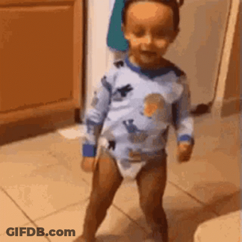 Baby In Diaper Walking In Kitchen GIF