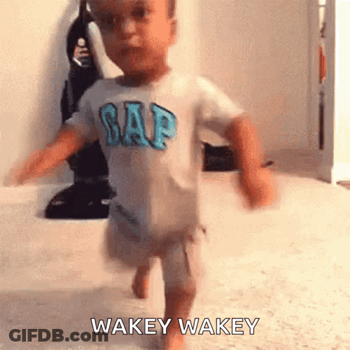Baby In Gap Shirt Running On Carpet GIF