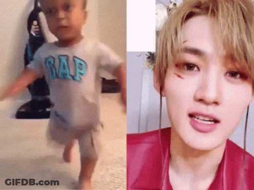 Baby In Gap Shirt Walking Next To Man In Pink Shirt GIF