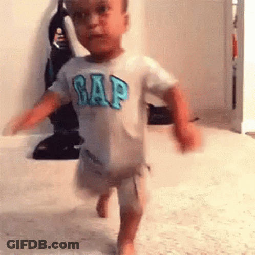 Baby In Gap Shirt Walking On Floor GIF