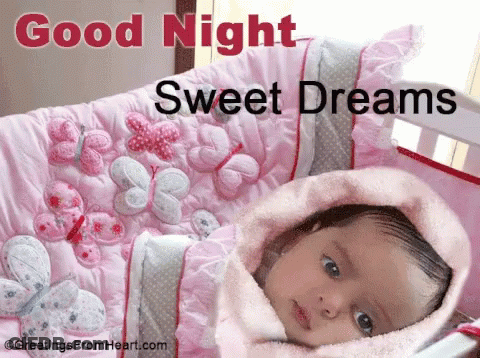 Baby In Pink Blanket Saying Good Night Sweet Dreams GIF