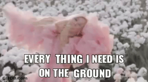 Baby In Pink Dress Lying In Cotton Field GIF