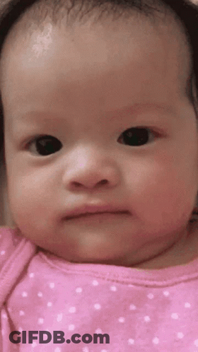 Baby In Pink Polka Dot Shirt GIF