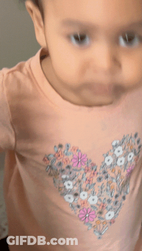 Baby In Pink Shirt With Heart GIF