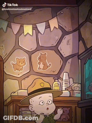 Baby In Ranger Hat In Front Of Wall With Animals GIF