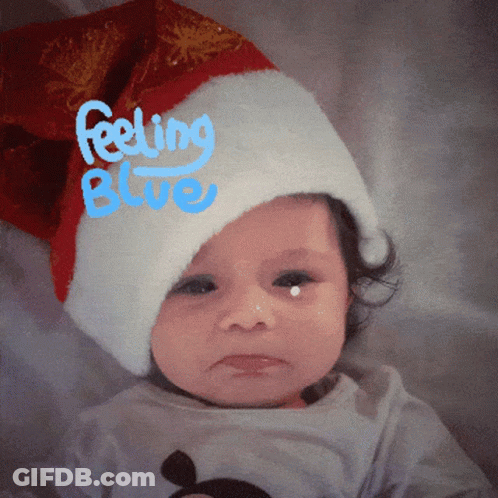 Baby In Santa Hat Saying Feeling Blue GIF