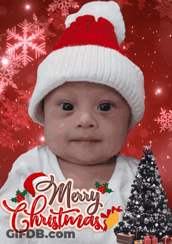 Baby In Santa Hat Saying Merry Christmas GIF