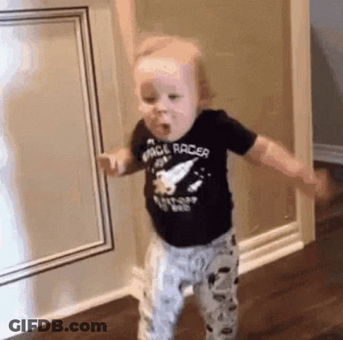 Baby In Space Racer Shirt Dancing In Hallway GIF