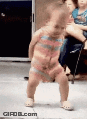 Baby In Striped Outfit Dancing GIF