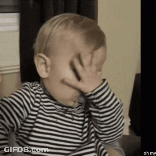 Baby In Striped Shirt Covering Face GIF