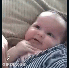 Baby In Striped Shirt Held Smiling GIF