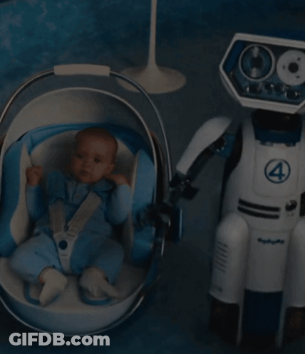 Baby In Stroller Next To Robot With Number 4 GIF
