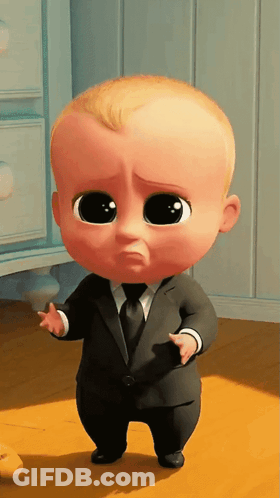 Baby In Suit And Tie Standing On Wood Floor GIF