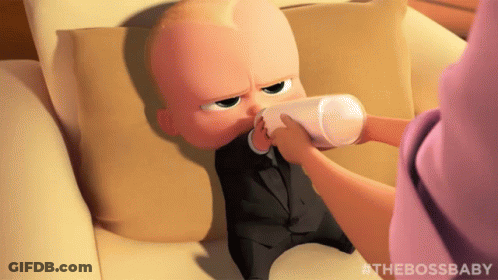 Baby In Suit Drinking Milk From Bottle GIF