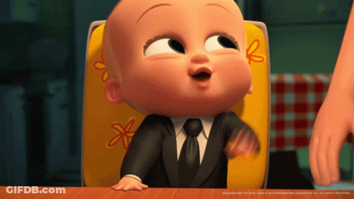 Baby In Suit Sitting In Chair GIF