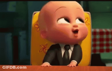 Baby In Suit Sitting In High Chair GIF