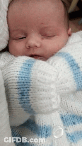 Baby In White And Blue Sweater GIF