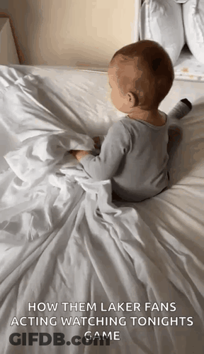 Baby Laying On Bed How Them Laker Fans Acting Watching Tonights Game GIF