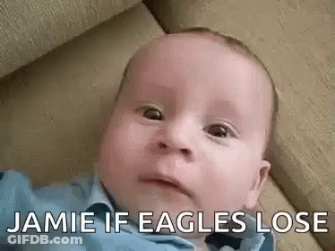 Baby Laying On Couch Making Funny Face Jamie If Eagles Lose GIF