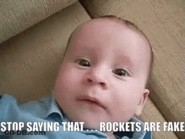 Baby Laying On Couch Stop Saying That Rockets Are Fake GIF