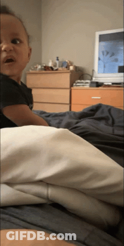 Baby Lying On Bed GIF