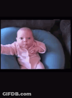 Baby Lying On Blue Pillow GIF