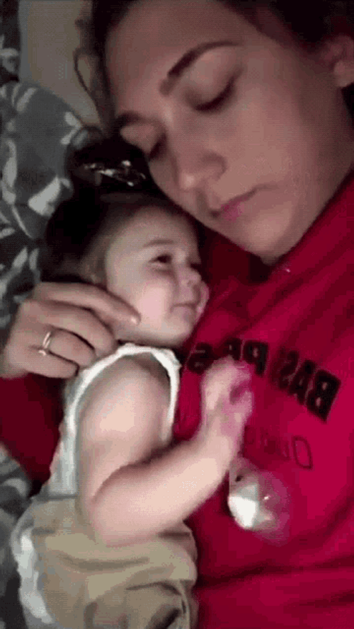 Baby Lying On Mom GIF