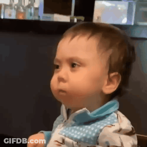 Baby Making Funny Face GIF