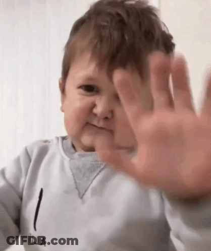 Baby Making Funny Face Covering Ears GIF