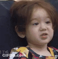 Baby Making Funny Face GIF
