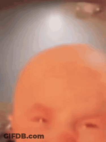 Baby Making Funny Face GIF
