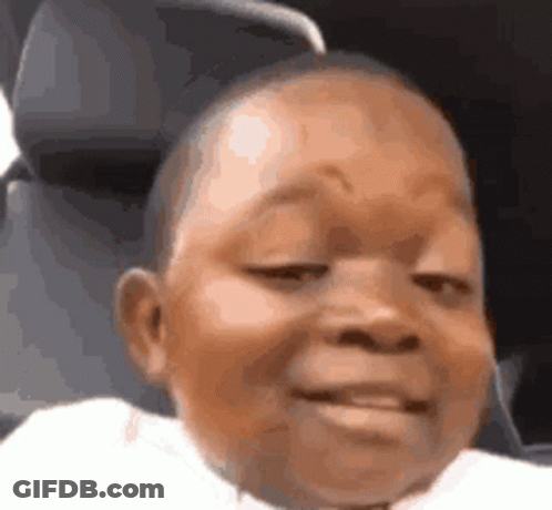 Baby Making Funny Face In Car Seat GIF