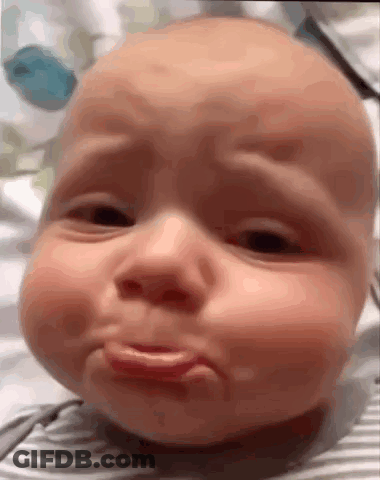 Baby Making Funny Face GIF