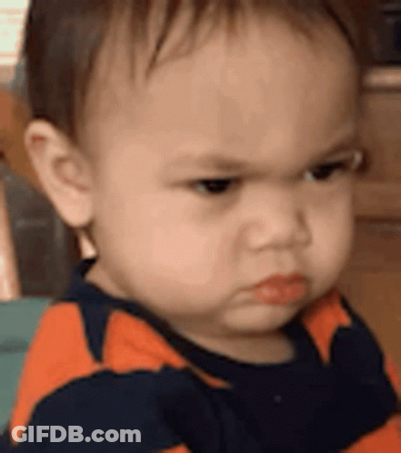 Baby Making Funny Face GIF