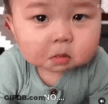 Baby Making Funny Face Saying No GIF