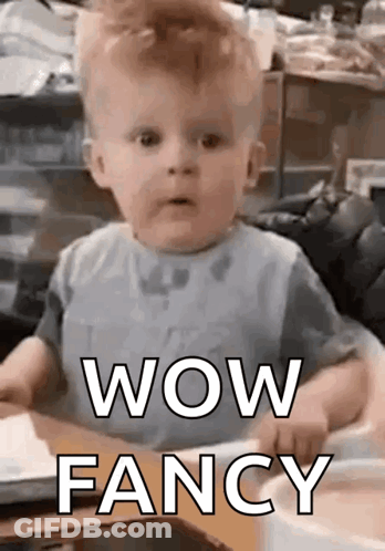 Baby Making Funny Face Saying Wow GIF