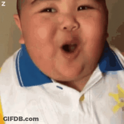 Baby Making Funny Face White Blue Shirt GIF